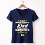 Never Underestimate A Dad Who Is Also A Green Bay Packers Fan 5 Womens V Neck.jpg