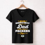 Never Underestimate A Dad Who Is Also A Green Bay Packers Fan 7 Womens V Neck.jpg