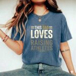 This Dad Loves Raising Athletes Comfort Colors T Shirt 2.jpg